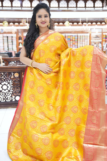 CSM-17443 | Mustard & Red Kanchi Kalakshetra pattu Saree