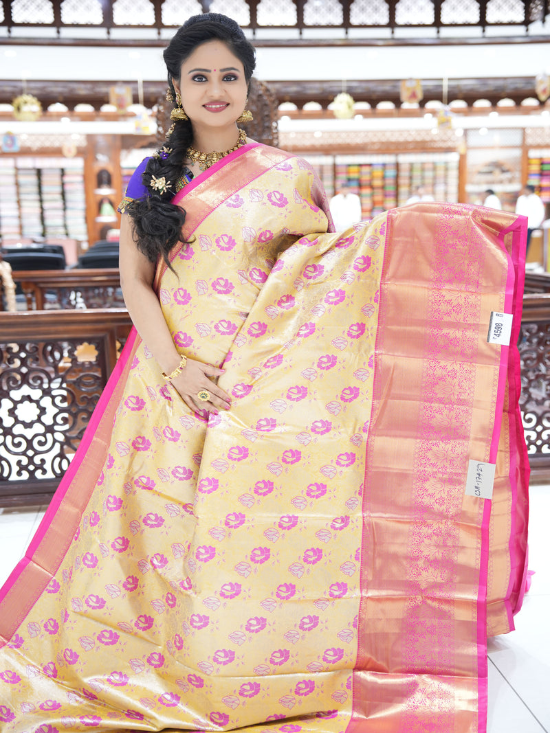 CSM-17429 | Lemon Yellow & Rani Pink Kanchi Tissue Pattu Saree