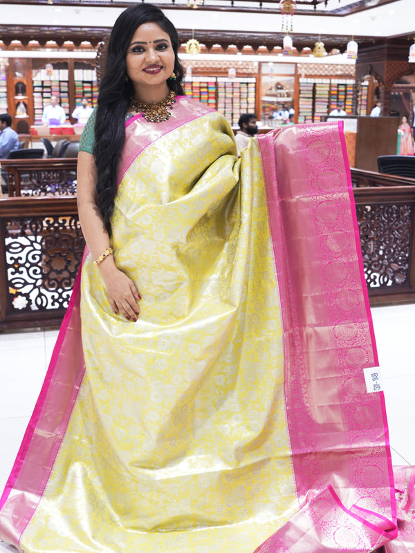 CSM-18499 | Lemon Yellow & Magenta Kanchi Padiya Pattu Saree